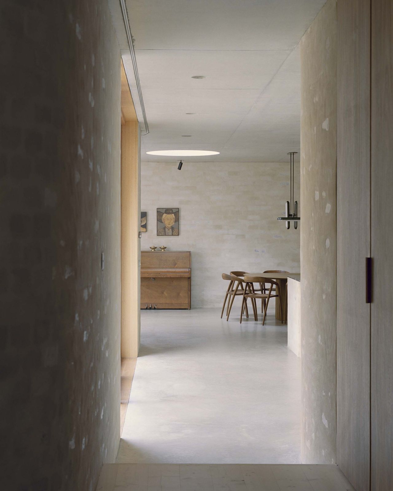 Mary Street House corridor looking toward the dining area and pendant light